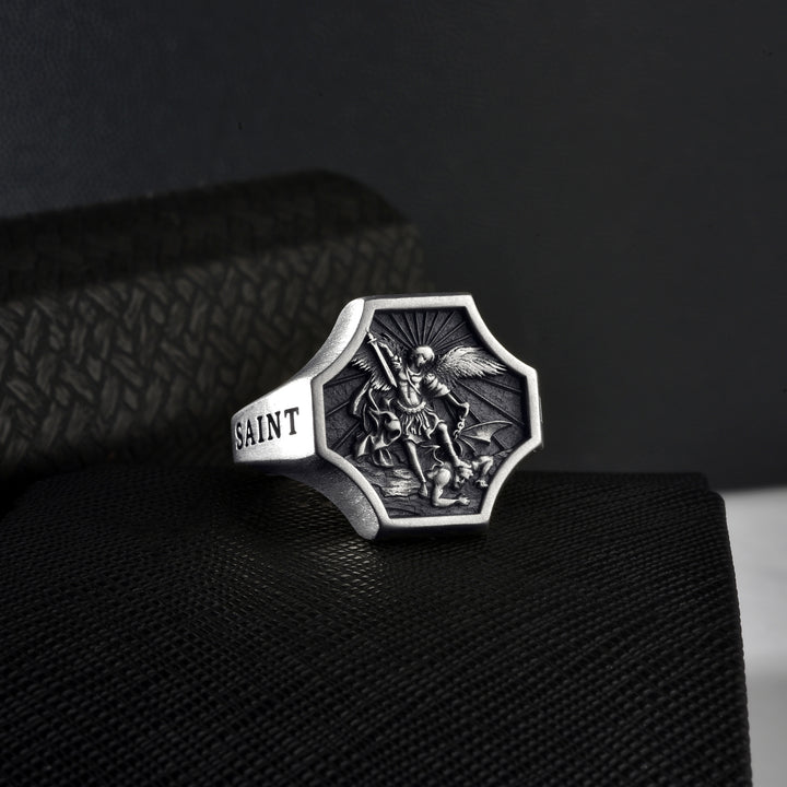 Silver ring with 'SAINT' engraving on the side