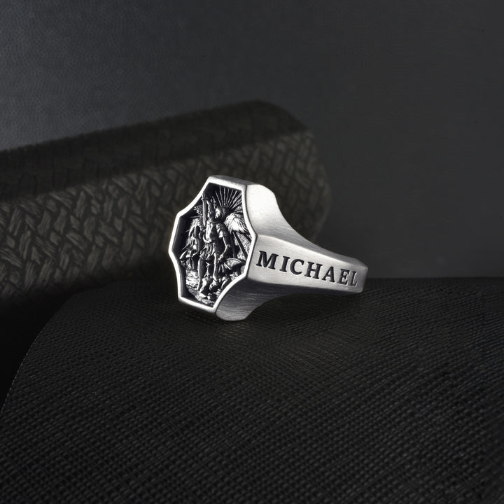 Silver ring with 'MICHAEL' engraving on the side
